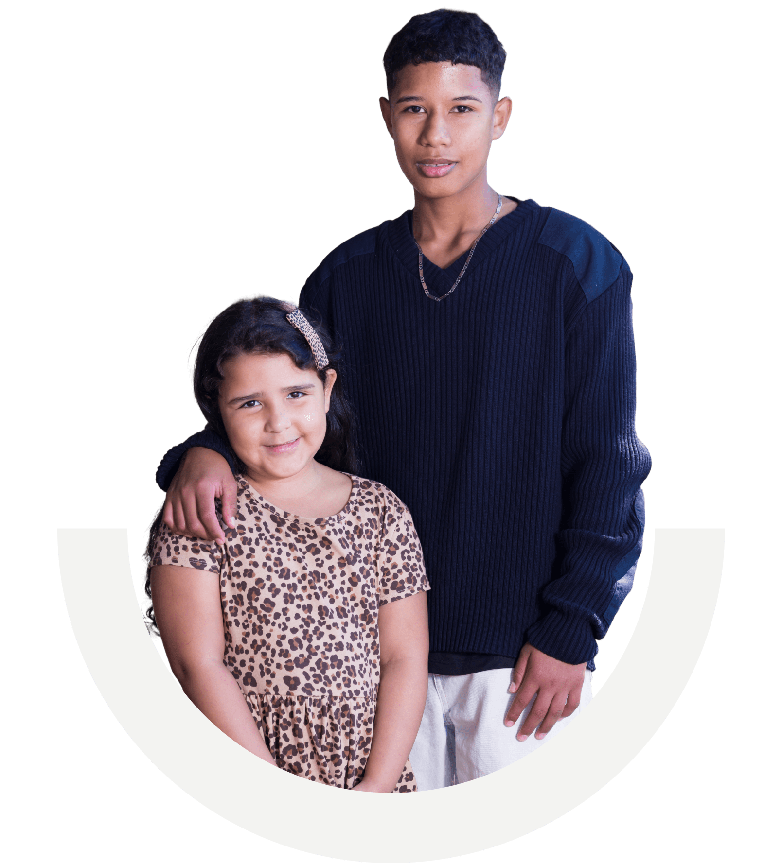 Cut out of a portait image of older brother and younger sister smiling