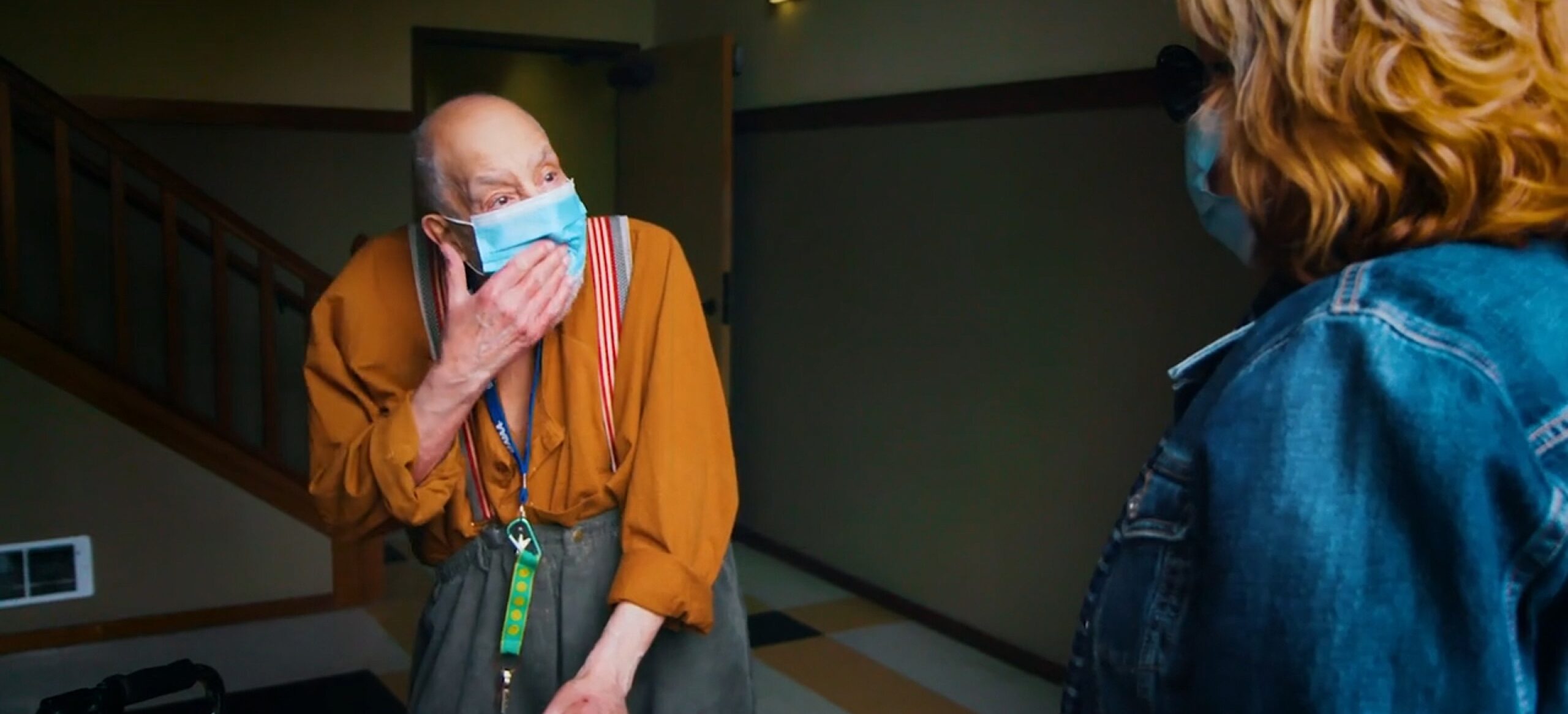 Older man looking suprised with a mask on