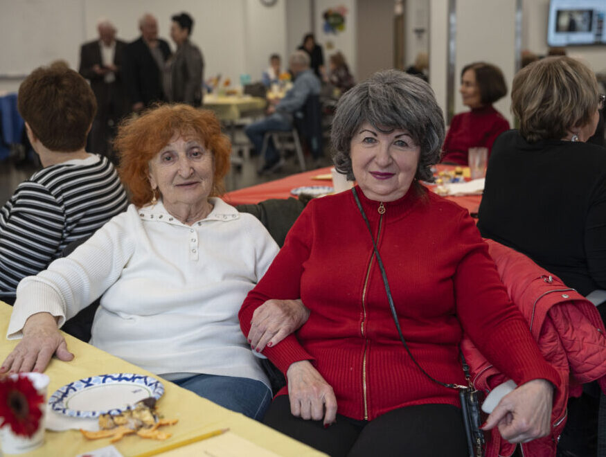 Two older women at the Holocaust Survivors event