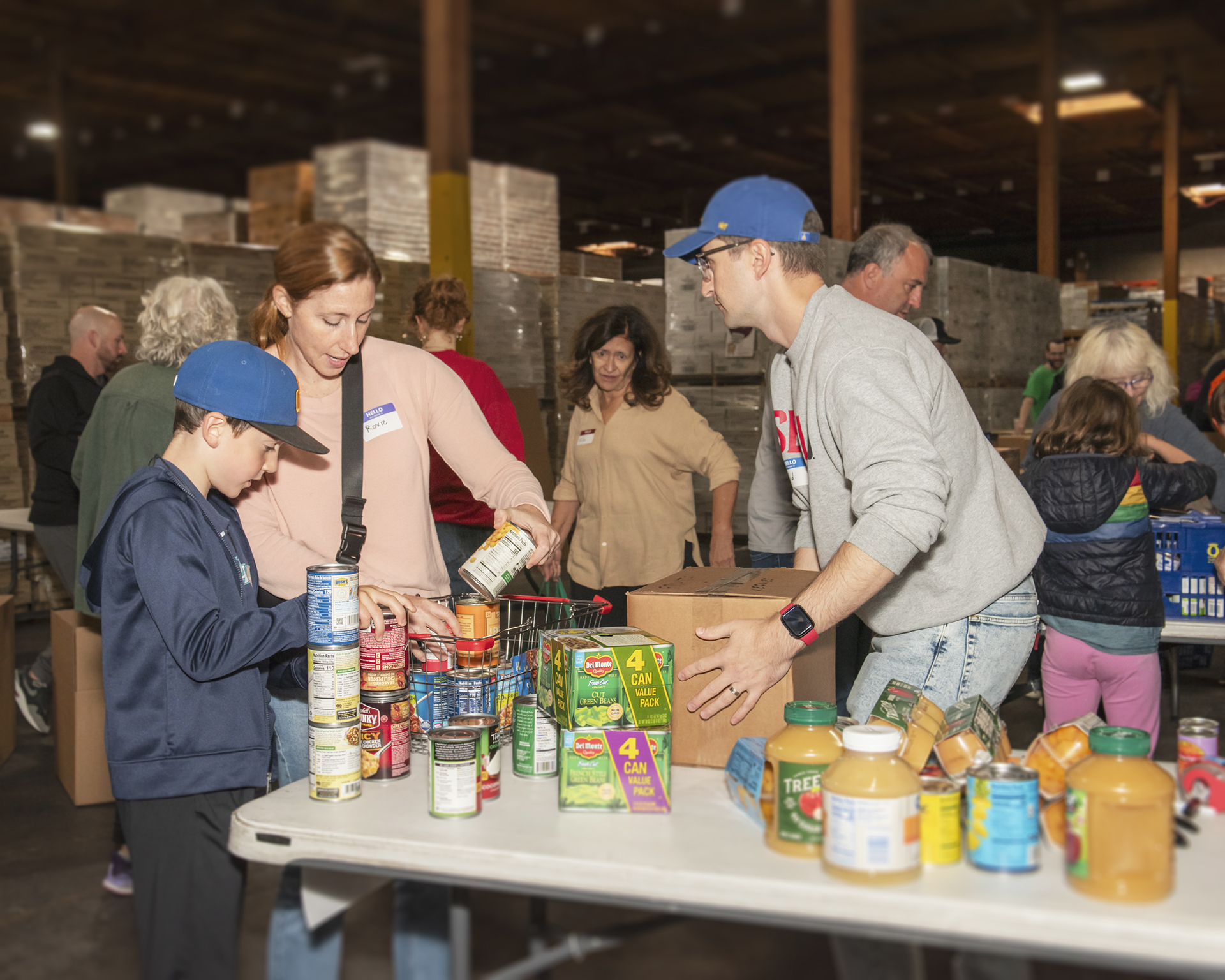 family organizing food at the Food Sort